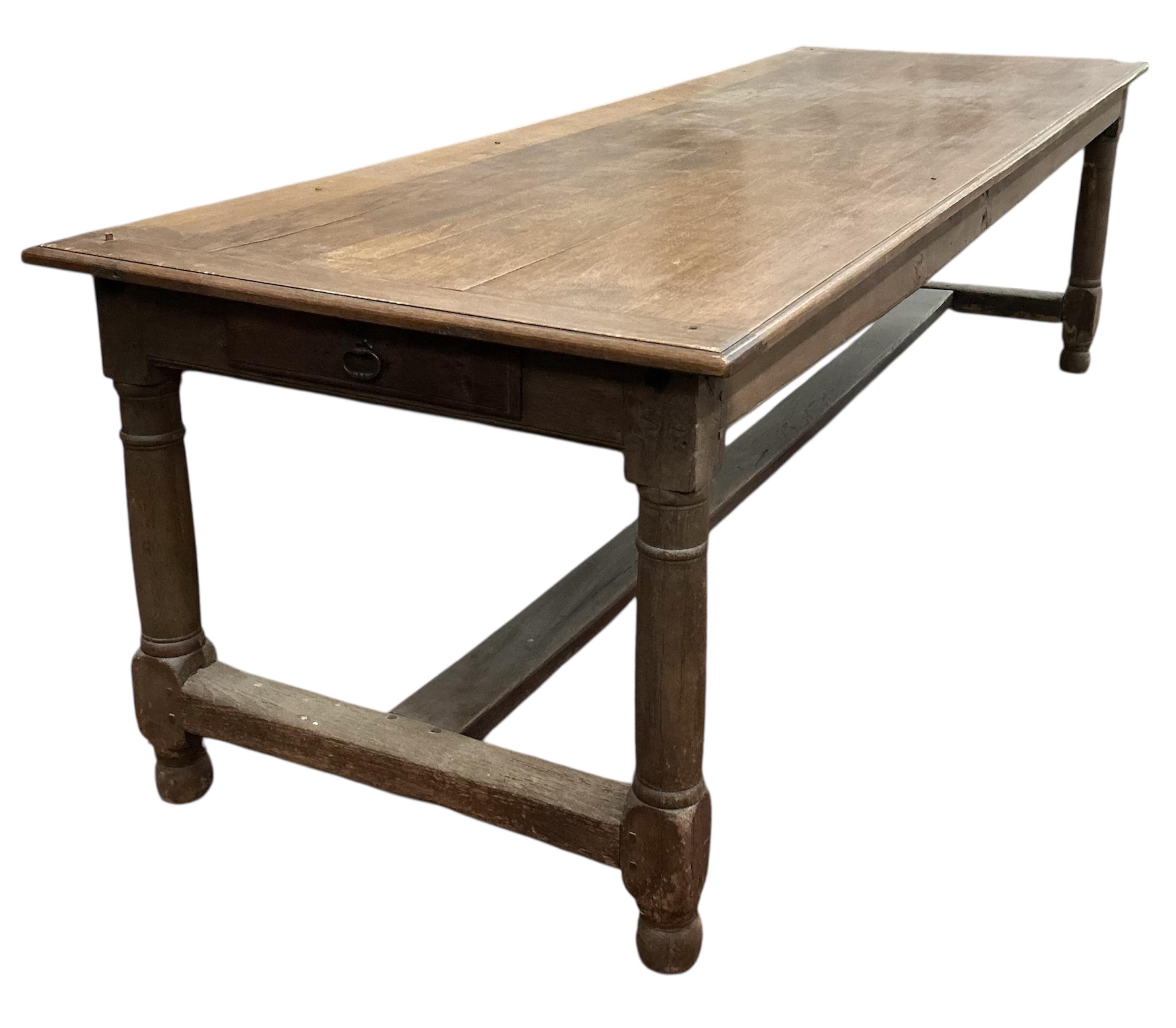 A late 19th century French oak rectangular refectory table, width 258cm, depth 88cm, height 75cm
